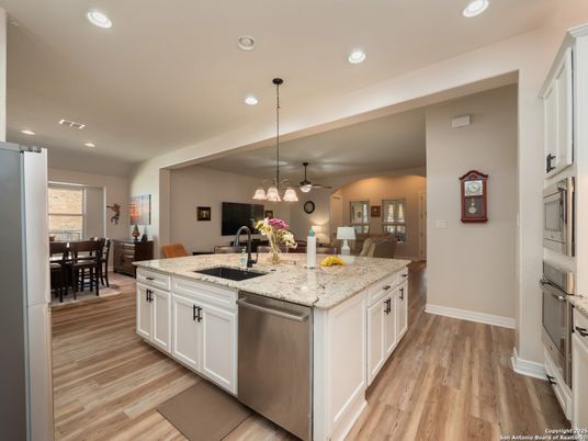 Dining room, Interior, Kitchen, Pendant Lights, Recessed Lighting, Stainless Steel Appliances, Wood Texture Flooring