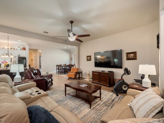 Dining room, Fitness Equipment, Interior, Living room, Pendant Lights, Recessed Lighting, Wood Texture Flooring