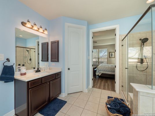 Bathroom, Bedroom, Dual Sink Vanities, Glass Shower, Interior, Wood Texture Flooring