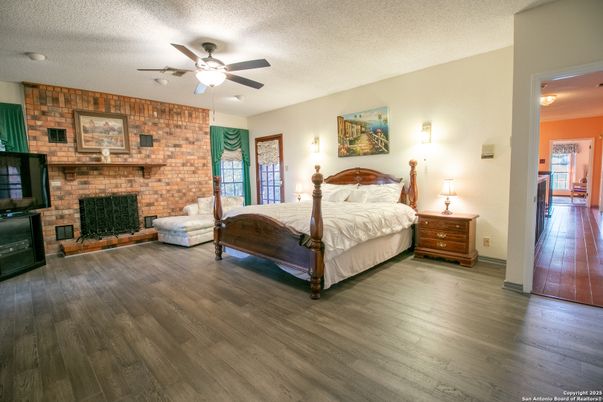 Bedroom, Fireplace, Interior, Stone Walls, Wood Texture Flooring