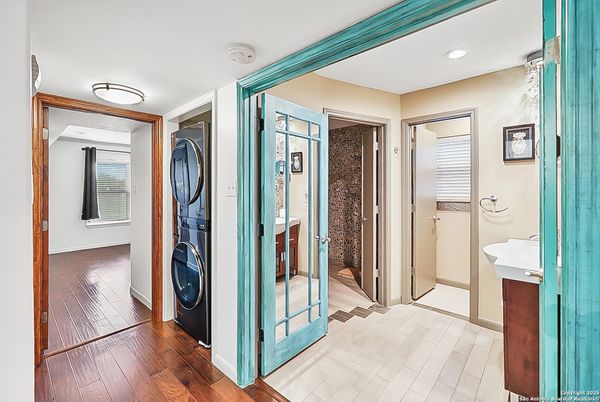 Bathroom, Interior, Recessed Lighting, Utility Closets, Washer, Wood Texture Flooring