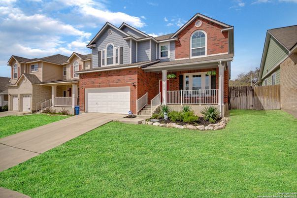 Attached, Exterior, Facade, Brick Facade, American Craftsman