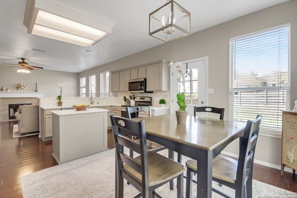 Dining room, Interior, Kitchen, Pendant Lights, Stainless Steel Appliances, Wood Texture Flooring