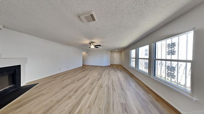 Empty room, Fireplace, Interior, Recessed Lighting, Wood Texture Flooring