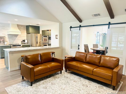 Dining room, Interior, Kitchen, Living room, Recessed Lighting, Stainless Steel Appliances, Wooden Beams, Wood Texture Flooring