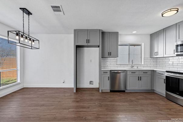 Interior, Kitchen, Pendant Lights, Recessed Lighting, Stainless Steel Appliances, Wood Texture Flooring