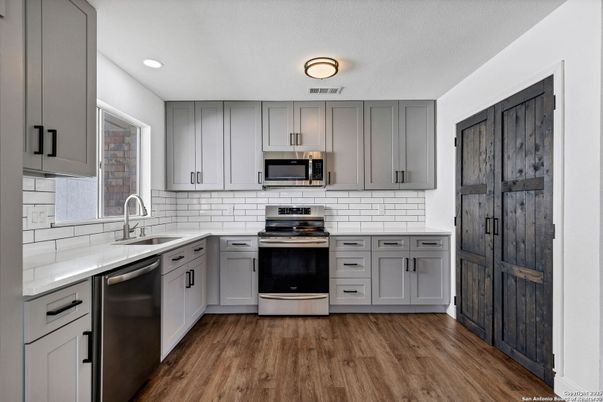 Interior, Kitchen, Recessed Lighting, Stainless Steel Appliances, Wood Texture Flooring