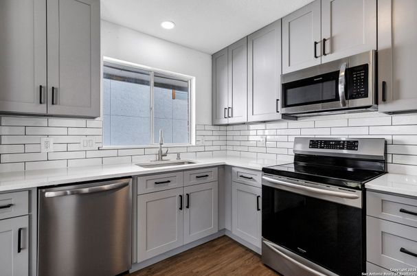Interior, Kitchen, Recessed Lighting, Stainless Steel Appliances, Wood Texture Flooring
