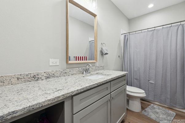 Bathroom, Dual Sink Vanities, Interior, Recessed Lighting, Wood Texture Flooring