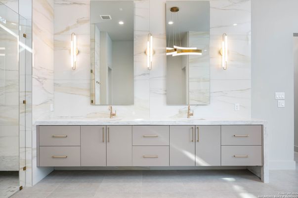 Bathroom, Dual Sink Vanities, Glass Shower, Interior, Marble Walls, Pendant Lights, Recessed Lighting