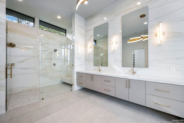 Bathroom, Dual Sink Vanities, Glass Shower, Interior, Marble Walls, Recessed Lighting