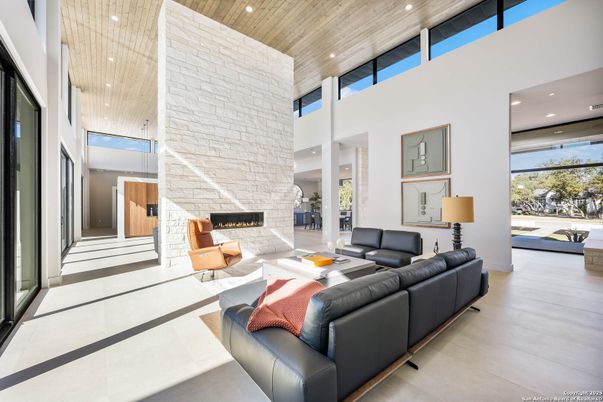 Fireplace, Interior, Living room, Recessed Lighting, Stone Walls, Wooden Ceilings, Wood Texture Flooring