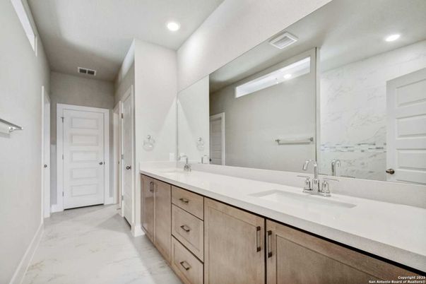 Bathroom, Dual Sink Vanities, Interior, Marble, Marble Walls, Recessed Lighting