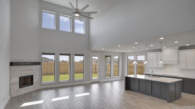 Fireplace, Interior, Kitchen, Pendant Lights, Recessed Lighting, Wood Texture Flooring