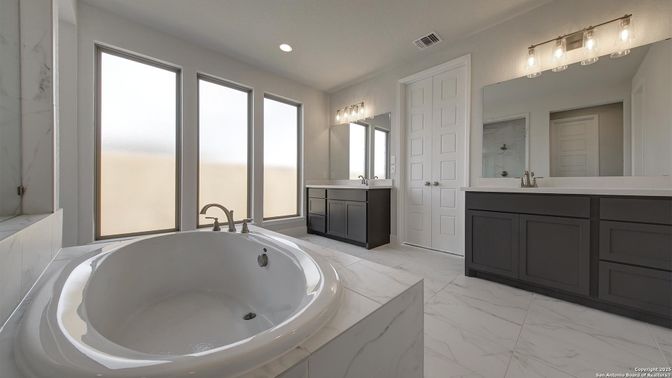 Bathroom, Dual Sink Vanities, Free Standing Baths, Interior, Marble, Recessed Lighting