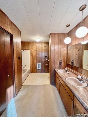 Bathroom, Dual Sink Vanities, Interior, Pendant Lights, Wooden Walls