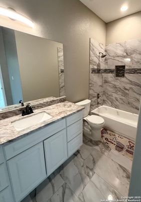 Bathroom, Dual Sink Vanities, Interior, Marble, Marble Walls, Recessed Lighting