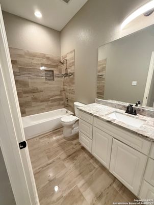 Bathroom, Dual Sink Vanities, Interior, Recessed Lighting, Wood Texture Flooring