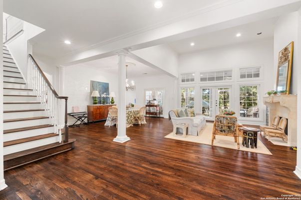 Chandelier, Dining room, Fireplace, Interior, Living room, Recessed Lighting, Wood Texture Flooring