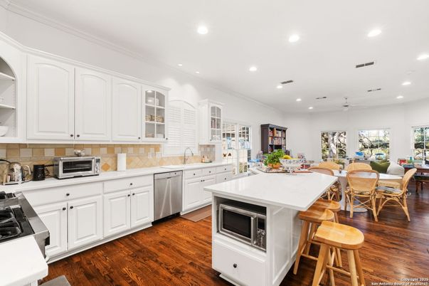 Dining room, Interior, Kitchen, Recessed Lighting, Stainless Steel Appliances, Wood Texture Flooring