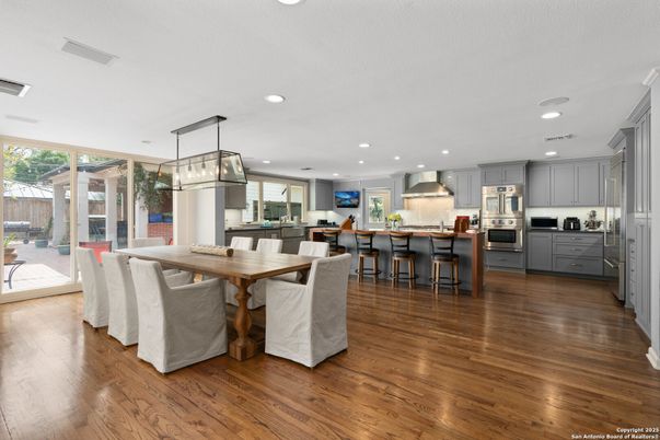 Dining room, Interior, Kitchen, Pendant Lights, Recessed Lighting, Stainless Steel Appliances, Wood Texture Flooring