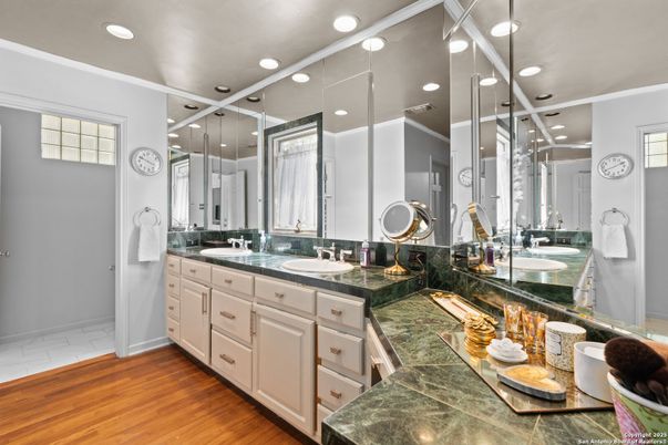 Bathroom, Dual Sink Vanities, Glass Shower, Interior, Recessed Lighting, Wood Texture Flooring