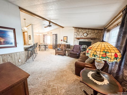 Dining room, Fireplace, Interior, Living room, Pendant Lights, Stone Walls