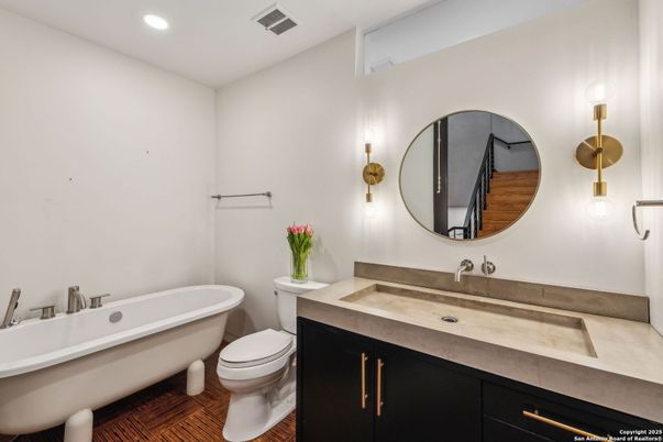 Bathroom, Dual Sink Vanities, Free Standing Baths, Interior, Recessed Lighting, Wood Texture Flooring