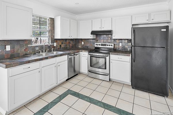 Interior, Kitchen, Stainless Steel Appliances, Tile Countertops