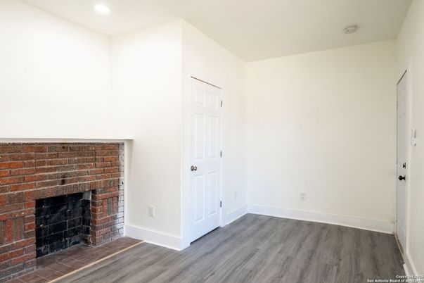 Empty room, Fireplace, Interior, Recessed Lighting, Wood Texture Flooring