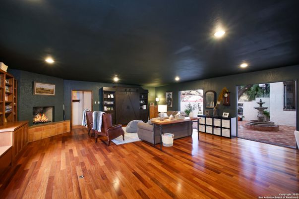 Fireplace, Interior, Living room, Recessed Lighting, Wood Texture Flooring