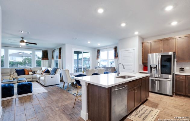 Dining room, Interior, Kitchen, Living room, Recessed Lighting, Stainless Steel Appliances, Wood Texture Flooring