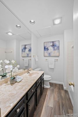 Bathroom, Dual Sink Vanities, Interior, Recessed Lighting, Wood Texture Flooring