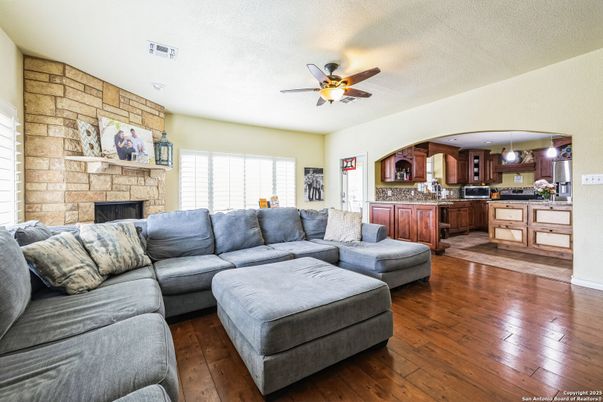 Fireplace, Interior, Kitchen, Living room, Pendant Lights, Stone Walls, Wood Texture Flooring