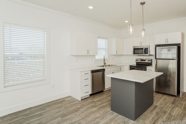 Interior, Kitchen, Pendant Lights, Recessed Lighting, Stainless Steel Appliances, Wood Texture Flooring