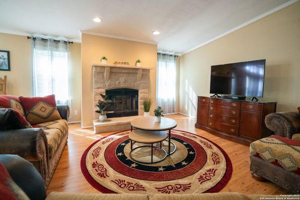 Fireplace, Interior, Living room, Recessed Lighting, Wood Texture Flooring