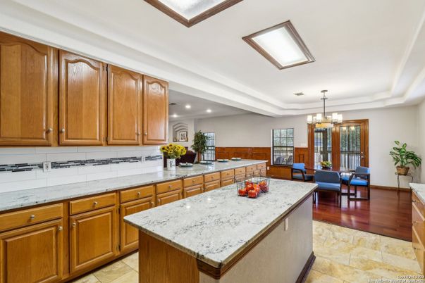 Chandelier, Dining room, Interior, Kitchen, Living room, Recessed Lighting, Wood Texture Flooring