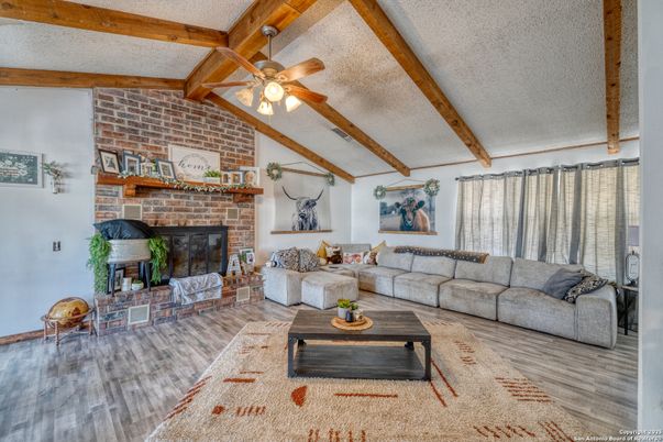 Fireplace, Interior, Living room, Stone Walls, Wooden Beams, Wood Texture Flooring