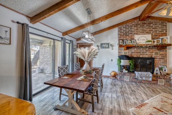 Dining room, Fireplace, Interior, Pendant Lights, Stone Walls, Wooden Beams, Wood Texture Flooring