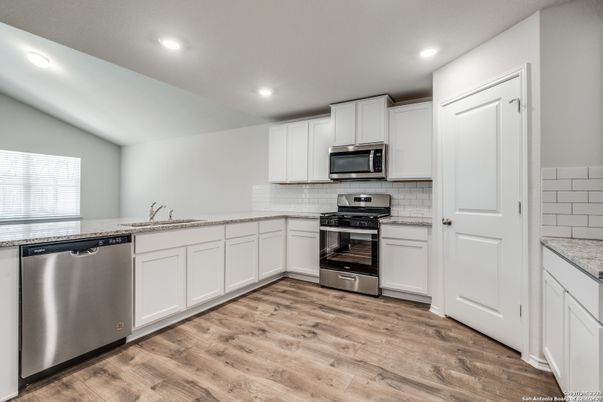 Interior, Kitchen, Recessed Lighting, Stainless Steel Appliances, Wood Texture Flooring
