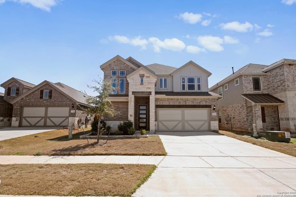 Attached, Exterior, Facade, Brick Traditional