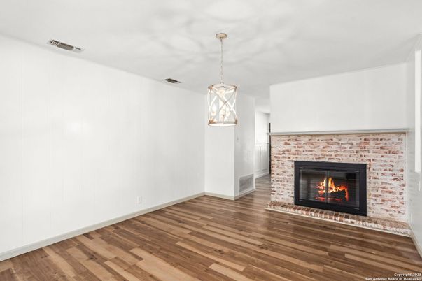 Empty room, Fireplace, Interior, Pendant Lights, Wood Texture Flooring