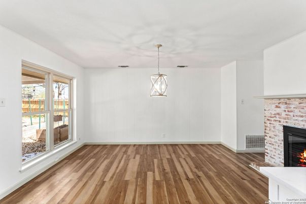 Empty room, Fireplace, Interior, Pendant Lights, Wood Texture Flooring