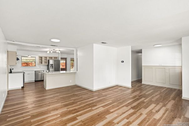 Empty room, Interior, Kitchen, Stainless Steel Appliances, Wood Texture Flooring