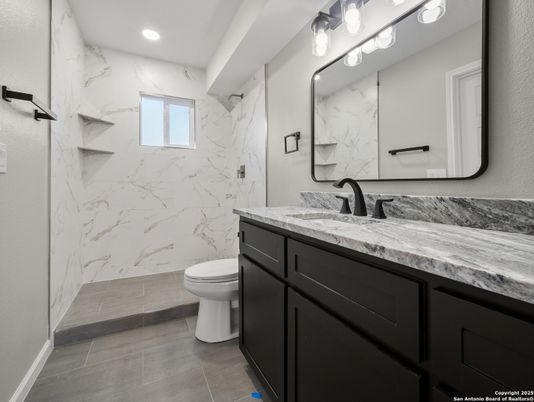 Bathroom, Dual Sink Vanities, Interior, Marble Walls, Recessed Lighting