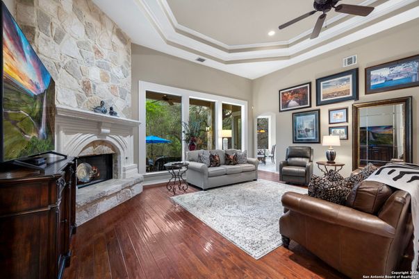 Fireplace, Interior, Living room, Recessed Lighting, Stone Walls, Wood Texture Flooring