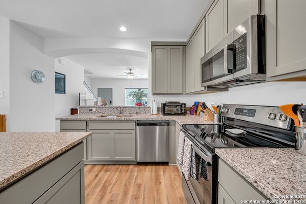 Interior, Kitchen, Recessed Lighting, Stainless Steel Appliances, Wood Texture Flooring