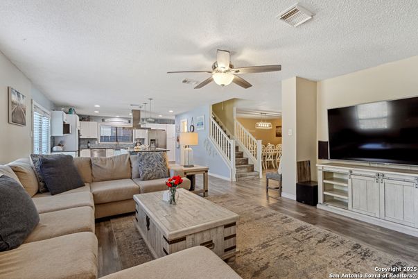 Dining room, Interior, Kitchen, Living room, Pendant Lights, Recessed Lighting, Stainless Steel Appliances, Wood Texture Flooring