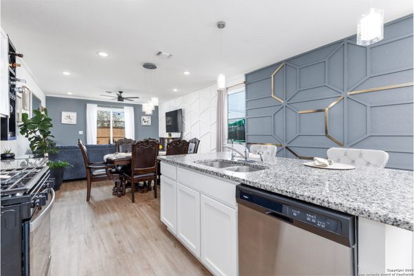 Dining room, Interior, Kitchen, Pendant Lights, Recessed Lighting, Stainless Steel Appliances, Wood Texture Flooring