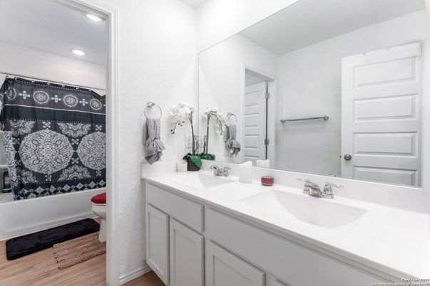 Bathroom, Dual Sink Vanities, Interior, Recessed Lighting, Wood Texture Flooring